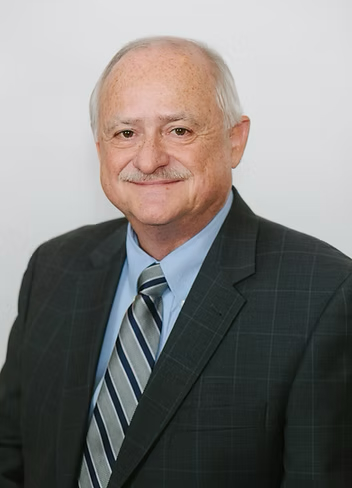 A Tribute to Mark C. Schug’s Career in Economic Education
